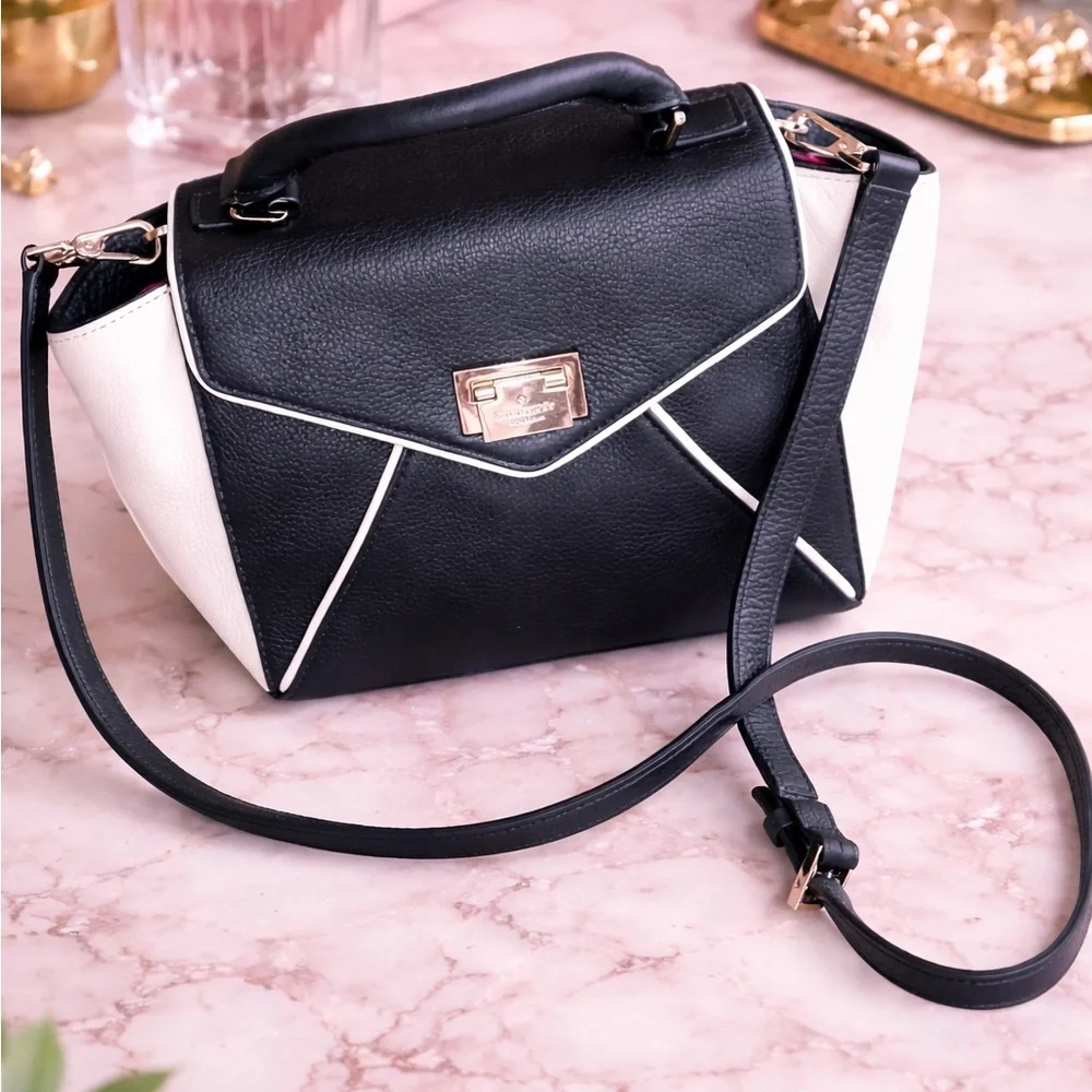 Kate Spade Elegant Black and White pebbled leather Handbag with crossbody strap